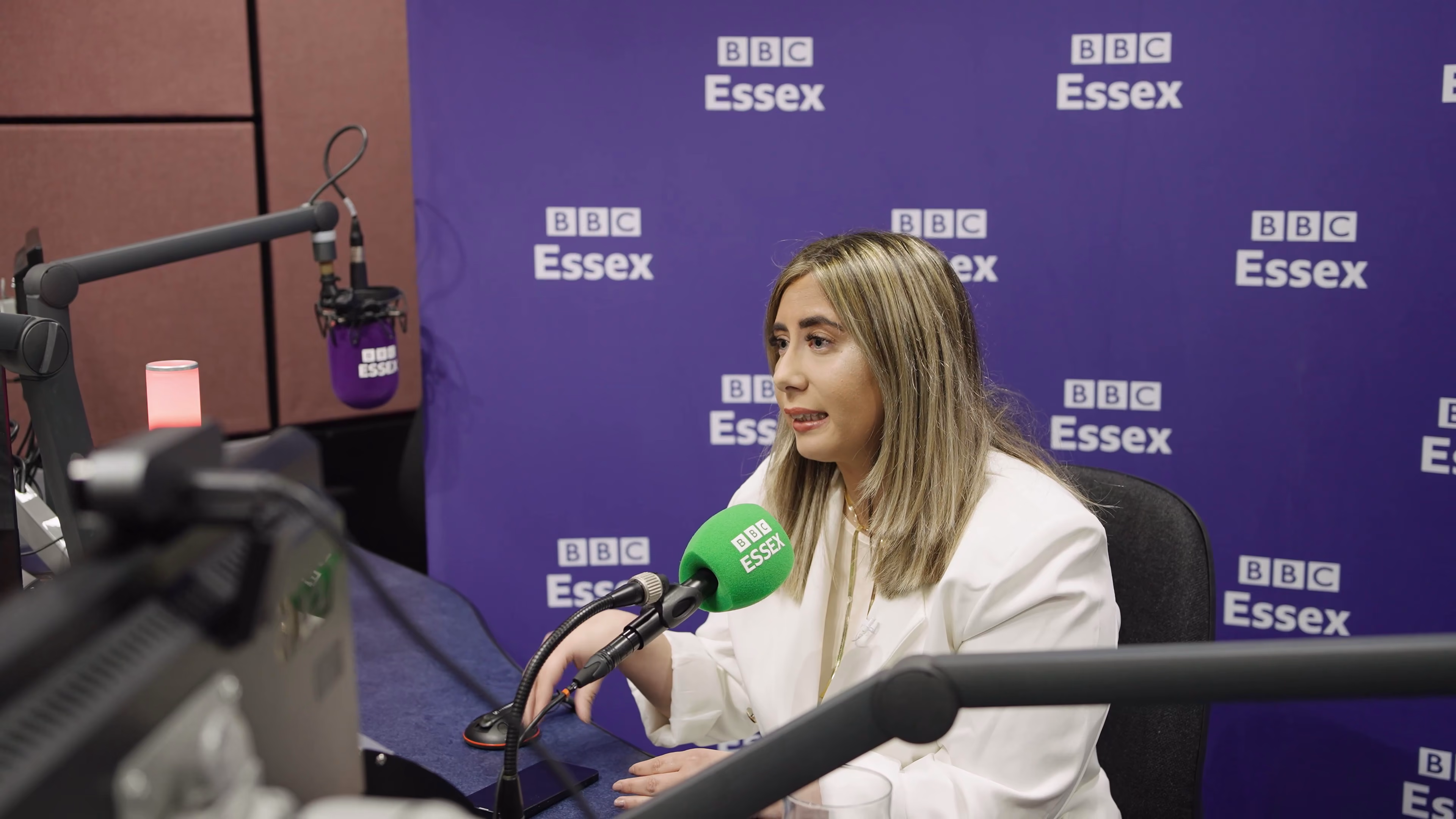 Sophie Taylor speaking during a professionally filmed radio interview